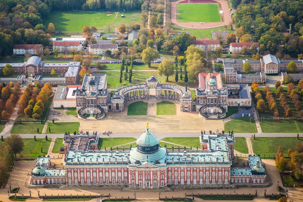 Potsdam & Sanssouci Palace - Enjoy a guided day tour from Berlin to Potsdam. Travel by coach, visit Alexandrovka UNESCO site, explore Sanssouci Palace and Park, and discover Frederick the Great’s Prussian legacy. Potsdam & Sanssouci Palace - Image 1 of 5