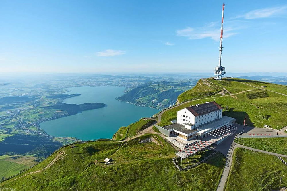 Mt. Rigi Day Tour with Cable Car, Cogwheel Train and Boat Cruise - Enjoy a scenic Mt. Rigi day tour from Zurich with cable car, cogwheel train, and Lake Lucerne boat cruise. Discover Lucerne Old Town, stunning Alpine views, and top Swiss attractions on this unforgettable full‑day trip. Mt. Rigi Day Tour with Cable Car, Cogwheel Train and Boat Cruise - Image 4 of 5