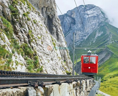 Lucerne tour with Mount Pilatus - Explore Mount Pilatus from Lucerne with a scenic gondola and Dragon Ride cable car. Enjoy breathtaking Swiss Alps views, visit 73 peaks, and discover Lucerne Old Town, Chapel Bridge, and Lion Monument. Lucerne tour with Mount Pilatus - Image 2 of 5