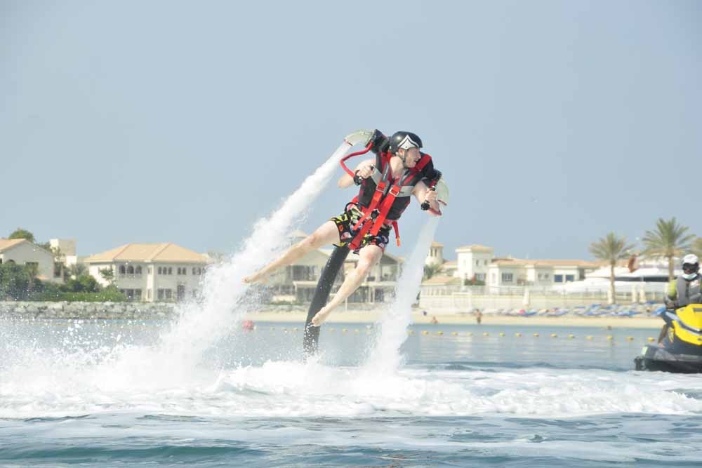 Jetpack in Dubai - The Jetpack is operating with a similar idea like any hydro sports, the first time you fly a jetpack you are immediately surprised to find that you are in fact sitting on the seat and your weight is all being carried by the saddle. The straps of the jetpack are holding you in place, but distribute none of your weight. Jetpack in Dubai - Image 2 of 5