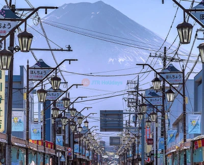 Mount Fuji scenic spot one-day tour - Explore Mount Fuji's most iconic spots on a guided one-day tour from Tokyo Station or Shinjuku Station. Visit Ladder Town (Fujiyoshida), Oshino Hakkai, Lake Kawaguchiko, and the famous Lawson convenience store. Daily departures, multilingual guides. Mount Fuji scenic spot one-day tour - Image 2 of 5