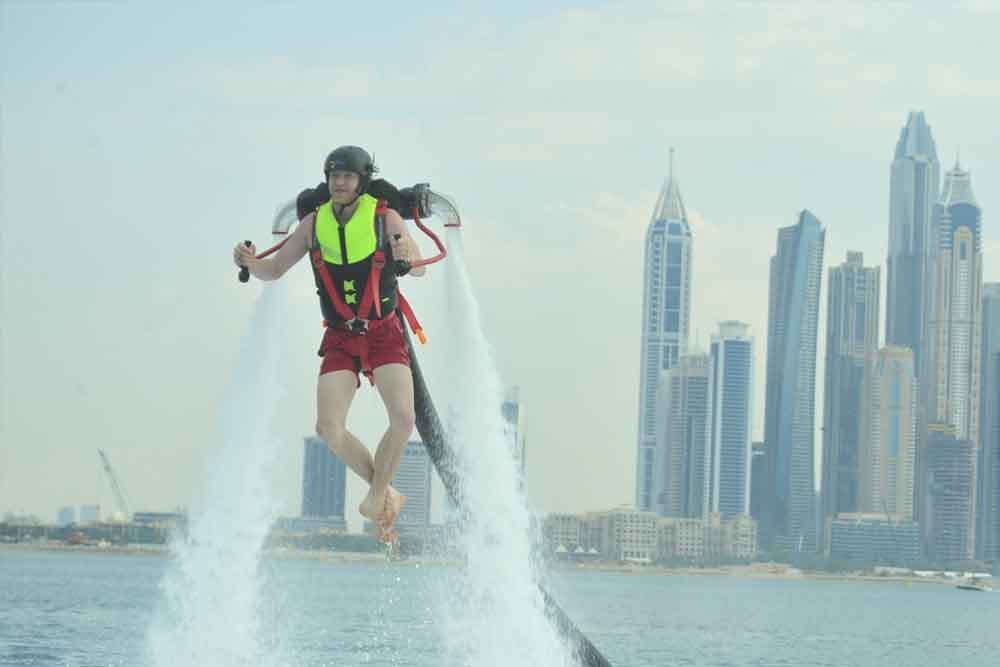 Jetpack in Dubai - The Jetpack is operating with a similar idea like any hydro sports, the first time you fly a jetpack you are immediately surprised to find that you are in fact sitting on the seat and your weight is all being carried by the saddle. The straps of the jetpack are holding you in place, but distribute none of your weight. Jetpack in Dubai - Image 4 of 5