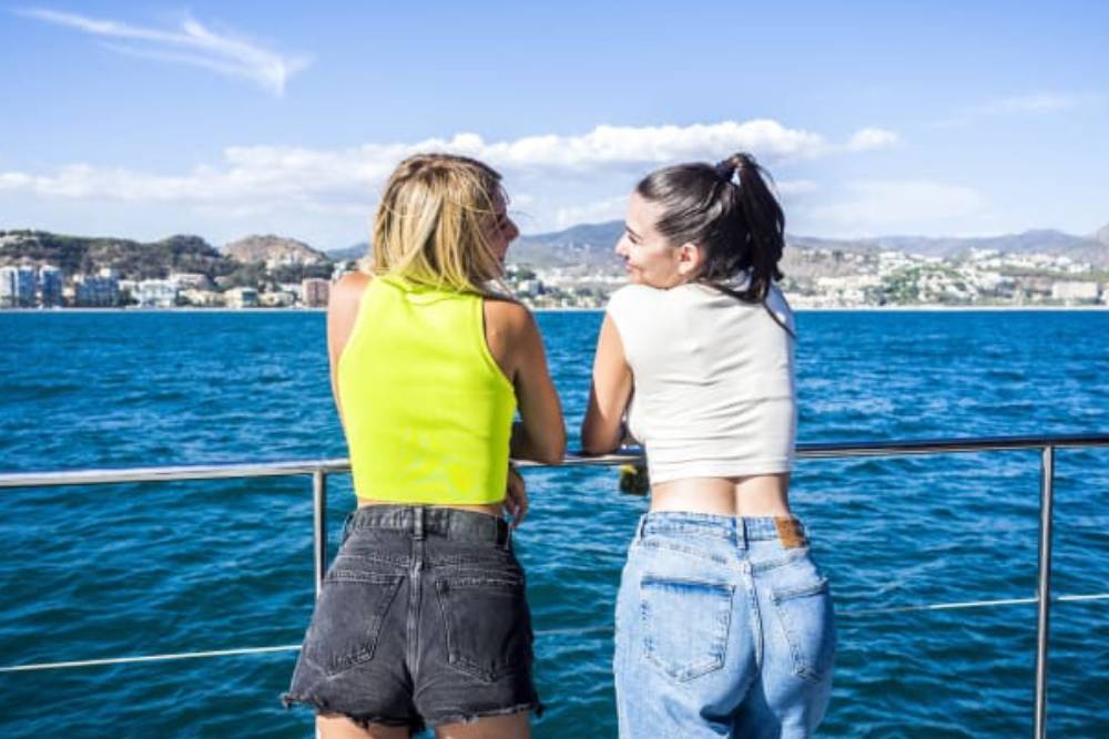 Valencia: Marina Catamaran Cruise - Enjoy a relaxing catamaran cruise from Valencia Marina with a welcome drink, scenic coastal views, and comfortable onboard facilities for a perfect sailing experience. Valencia: Marina Catamaran Cruise - Image 2 of 5