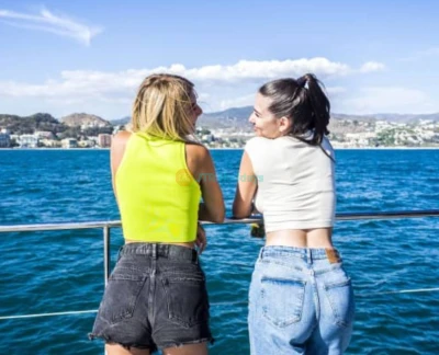 Valencia: Marina Catamaran Cruise - Enjoy a relaxing catamaran cruise from Valencia Marina with a welcome drink, scenic coastal views, and comfortable onboard facilities for a perfect sailing experience. Valencia: Marina Catamaran Cruise - Image 2 of 5