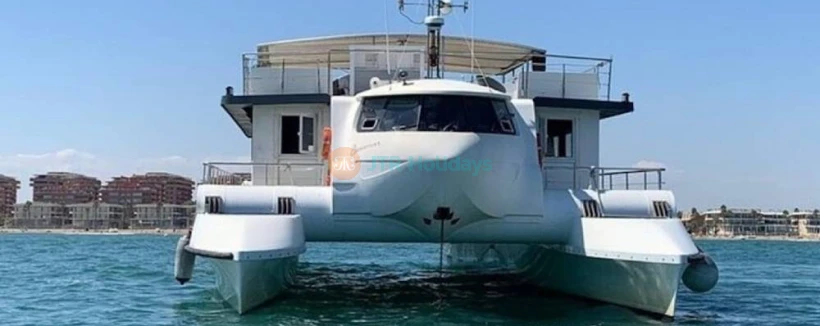 Valencia: Marina Catamaran Cruise - Enjoy a relaxing catamaran cruise from Valencia Marina with a welcome drink, scenic coastal views, and comfortable onboard facilities for a perfect sailing experience. Valencia: Marina Catamaran Cruise - Image 3 of 5