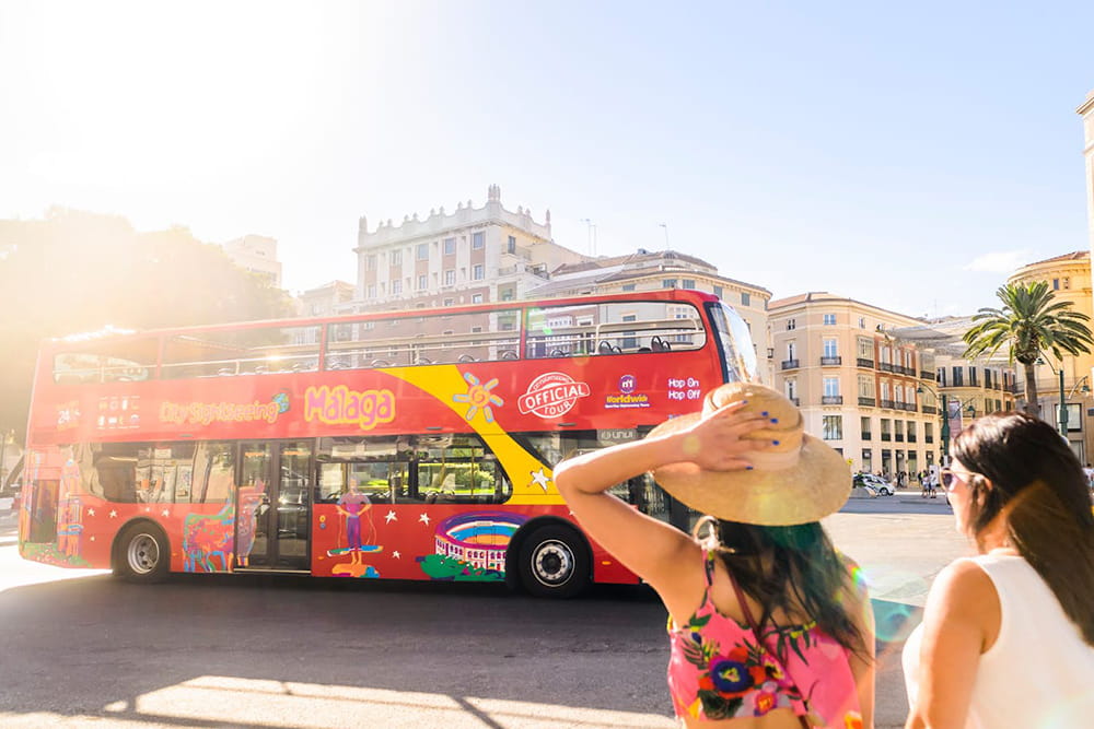City Sightseeing Malaga Hop-on Hop-off Bus Tour - Explore top attractions with the Málaga 24-hour hop-on hop-off bus tour. Enjoy flexible travel, panoramic city views, and multilingual audio commentary across 14 key stops. City Sightseeing Malaga Hop-on Hop-off Bus Tour - Image 2 of 5
