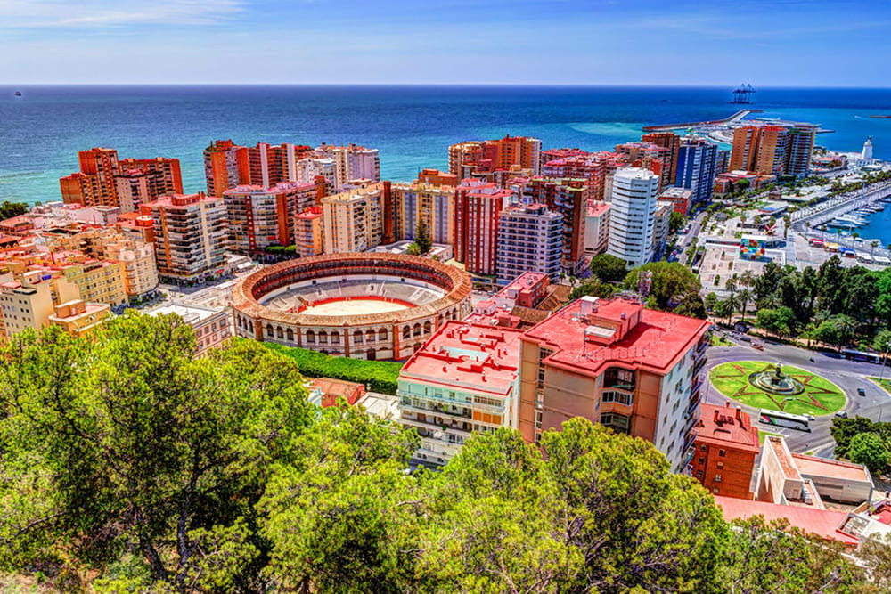City Sightseeing Malaga Hop-on Hop-off Bus Tour - Explore top attractions with the Málaga 24-hour hop-on hop-off bus tour. Enjoy flexible travel, panoramic city views, and multilingual audio commentary across 14 key stops. City Sightseeing Malaga Hop-on Hop-off Bus Tour - Image 3 of 5