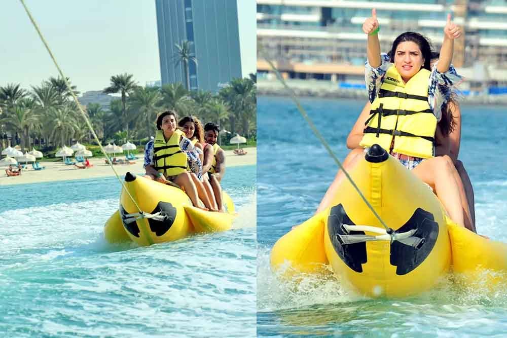 Banana Boat Ride Dubai - Banana ride makes you feel the vibe of a riding a stream ski. Most people who pick Banana Vessel ride are adrenaline searchers who have an excursion with family or gathering of friends, as it can oblige gathering of individuals without a moment's delay. Banana pontoon ride is a standout amongst the most usually attempted water exercises on the shorelines in Dubai. Banana Boat Ride Dubai - Image 2 of 5