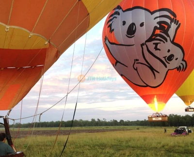Gold Coast Hot Air Balloon Experience with Sparkling Wine - Enjoy a breathtaking hot air balloon ride over the Gold Coast Hinterland with expert pilots, shared transfers, and sparkling wine. Safe, scenic, and unforgettable half-day experience. Gold Coast Hot Air Balloon Experience with Sparkling Wine - Image 5 of 5
