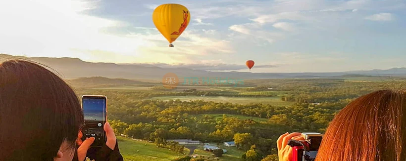 Cairns Hot Air Balloon and Jet Boat Experience - Experience a sunrise hot air balloon flight over the Atherton Tablelands and enjoy a thrilling 35-minute jet boat ride on Trinity Inlet. Includes stunning views, sparkling wine, and digital photos. Cairns Hot Air Balloon and Jet Boat Experience - Image 4 of 5