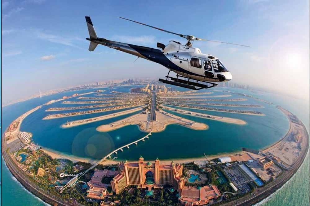 Private Helicopter Tour Dubai - Helicopter ride Dubai is created to ensure an unforgettable experience for all travelers and tourists who visit Dubai. Helicopter tour Dubai covers from the internationally renowned Burj Khalifa and world-famous Burj Al Arab to the spectacular beaches and The Palm Jumeirah. Private Helicopter Tour Dubai - Image 1 of 5