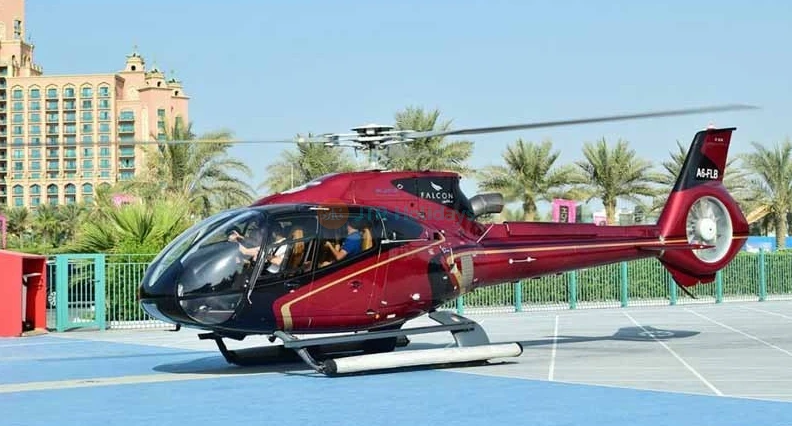 Private Helicopter Ride Dubai - The Palm - Book the most popular Helicopter Tours in Dubai. passenger helicopter and soar above the Palm Jumeirah, Burj Al-Arab and other top sights... Private Helicopter Ride Dubai - The Palm - Image 1 of 5