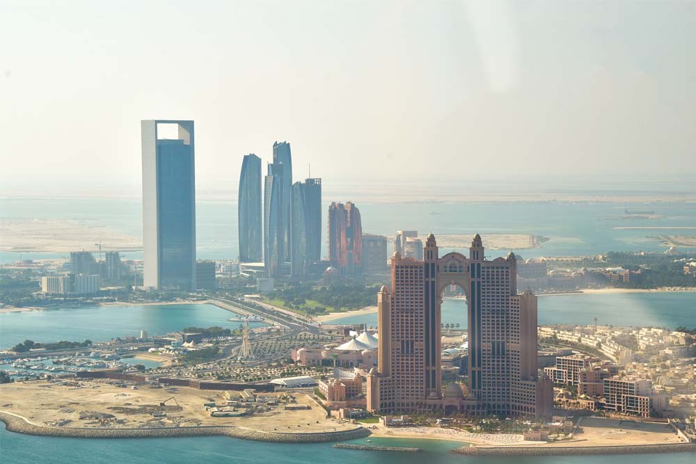 Helicopter Tour Abu Dhabi - Fly from Abu Dhabi’s most famous world renowned landmarks. Take a glimpse of the skyscrapers built in one of the most iconic roads in Abu Dhabi – Corniche. Fly towards the Marina Mall, Rixos Hotel, Emirates Palace, Presidential Palace, Heritage Village and see the tallest flagpole in the country. Catch the city of Abu Dhabi, Al Hudayriat Island, Sheikh Zayed Sports City, and the stunning Sheikh Zayed Grand Mosque. Helicopter Tour Abu Dhabi - Image 2 of 5