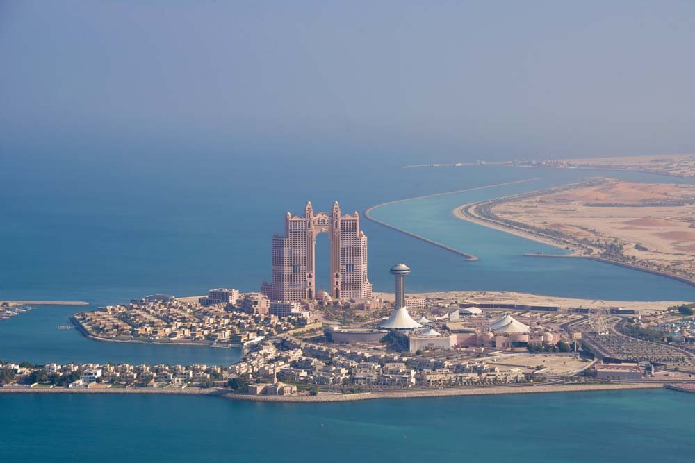Helicopter Tour Abu Dhabi - Fly from Abu Dhabi’s most famous world renowned landmarks. Take a glimpse of the skyscrapers built in one of the most iconic roads in Abu Dhabi – Corniche. Fly towards the Marina Mall, Rixos Hotel, Emirates Palace, Presidential Palace, Heritage Village and see the tallest flagpole in the country. Catch the city of Abu Dhabi, Al Hudayriat Island, Sheikh Zayed Sports City, and the stunning Sheikh Zayed Grand Mosque. Helicopter Tour Abu Dhabi - Image 5 of 5