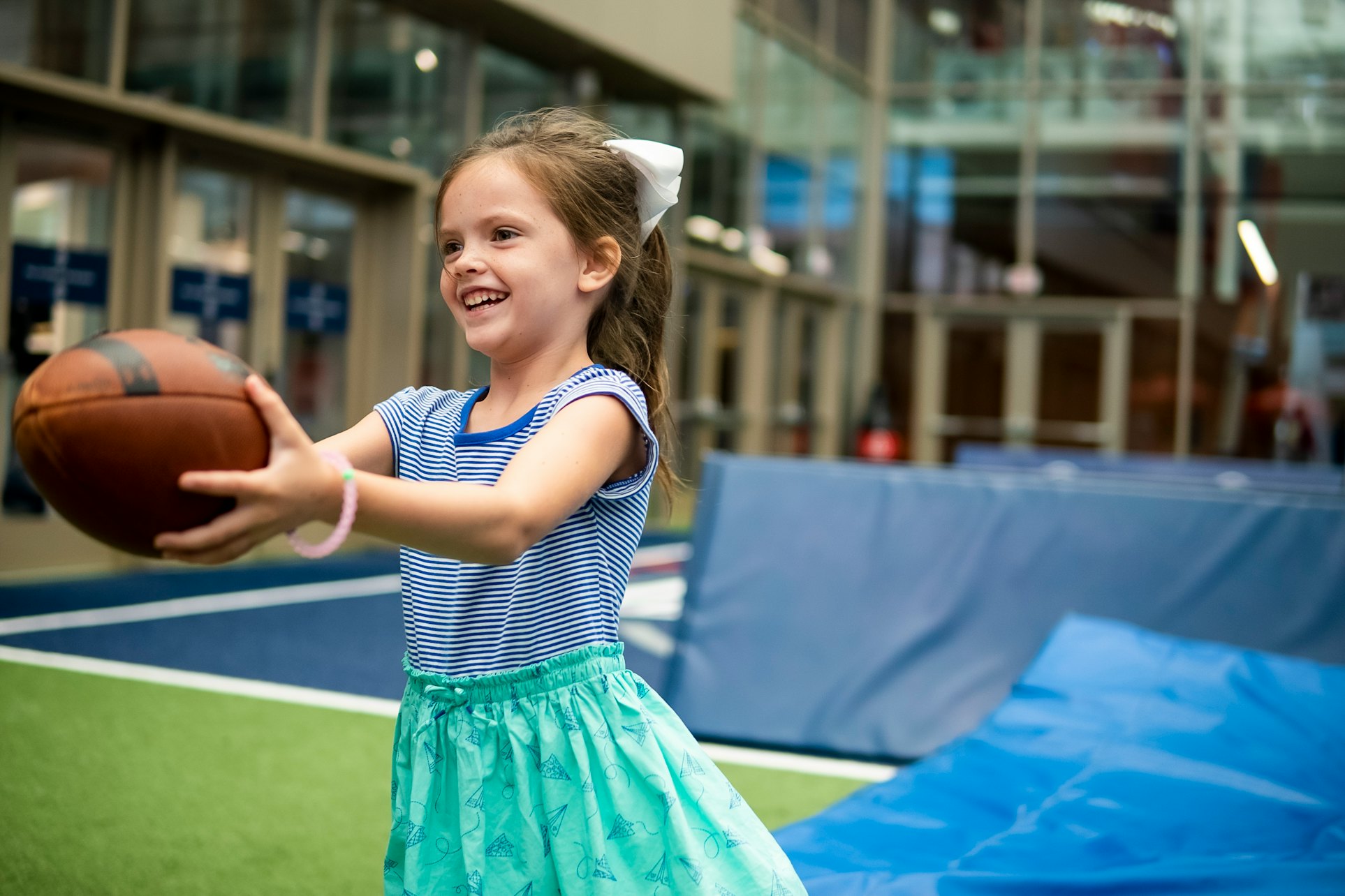College Football Hall of Fame - Explore interactive exhibits, memorabilia, and a 45-yard indoor football field at the College Football Hall of Fame in Atlanta. College Football Hall of Fame - Image 3 of 5