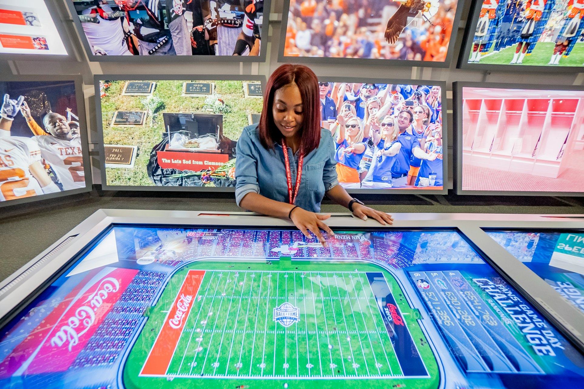 College Football Hall of Fame - Explore interactive exhibits, memorabilia, and a 45-yard indoor football field at the College Football Hall of Fame in Atlanta. College Football Hall of Fame - Image 4 of 5
