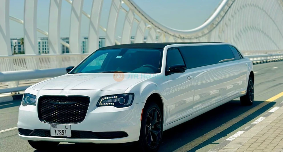 Limo Ride Dubai - Chrysler 300 ( 10 Pax) - Make your trip memorable with a luxury limousine ride to explore Dubai. There are many ways to explore Dubai. But nothing is better than a lavish ride to explore the world's most famous city. Choose from a number of luxury limousines and take a sightseeing ride in the city of gold. Limo Ride Dubai - Chrysler 300 ( 10 Pax) - Image 1 of 5
