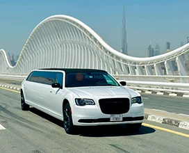Limo Ride Dubai - Chrysler 300 ( 10 Pax) - Make your trip memorable with a luxury limousine ride to explore Dubai. There are many ways to explore Dubai. But nothing is better than a lavish ride to explore the world's most famous city. Choose from a number of luxury limousines and take a sightseeing ride in the city of gold. Limo Ride Dubai - Chrysler 300 ( 10 Pax) - Image 2 of 5