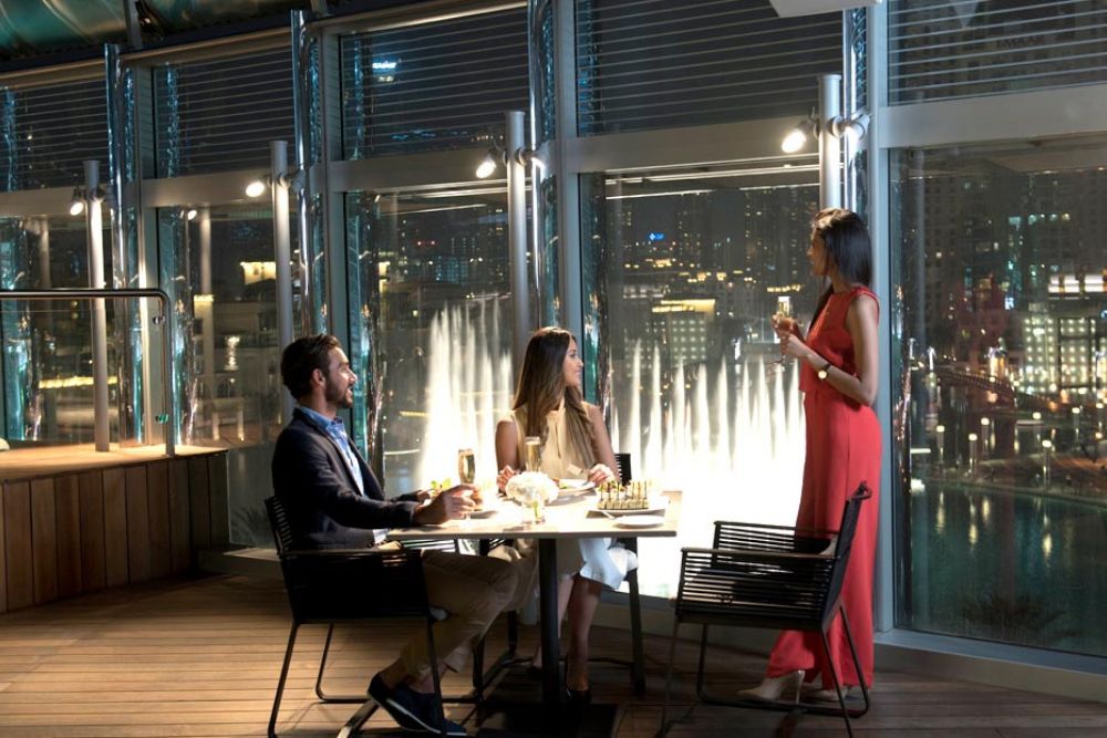 Burj Khalifa Level 124 -125 with Lunch or Dinner at the Burj Club Rooftop - Enjoy stunning views from Burj Khalifa Levels 124-125, followed by a delicious lunch or dinner at the Burj Club Rooftop. Capture unforgettable moments overlooking Dubai's skyline and the Dubai Fountain. Experience the best of luxury dining and sightseeing. Burj Khalifa Level 124 -125 with Lunch or Dinner at the Burj Club Rooftop - Image 1 of 5