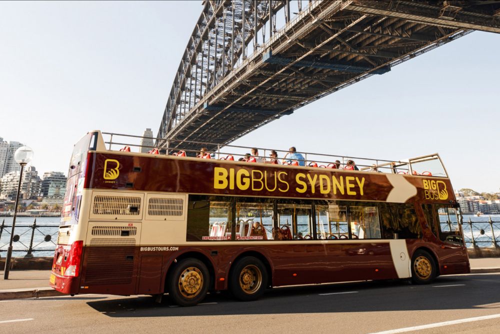 Big Bus Sydney Hop-on Hop-off Bus Tour - Discover Sydney's iconic landmarks with the Big Bus Hop-On, Hop-Off Tour. Explore at your own pace with stops at the Opera House, Bondi Beach, and more. Enjoy panoramic views and audio guides while traveling through the city’s best sights. Big Bus Sydney Hop-on Hop-off Bus Tour - Image 1 of 5