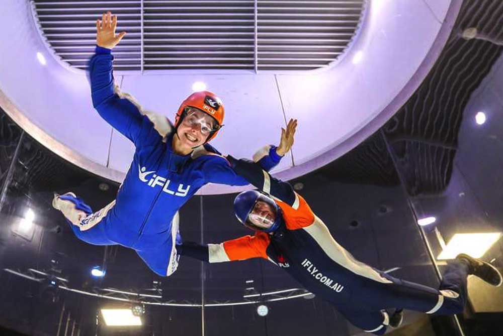 iFLY Indoor Skydiving Experience - Gold Coast - Experience the thrill of skydiving at iFLY Indoor Skydiving in Gold Coast! Suitable for all ages and skill levels, this exciting attraction offers a safe and fun way to enjoy the sensation of free-fall. With expert instructors and state-of-the-art technology, you'll receive personalized guidance as you fly. Book your unforgettable indoor skydiving adventure today. iFLY Indoor Skydiving Experience - Gold Coast - Image 1 of 5