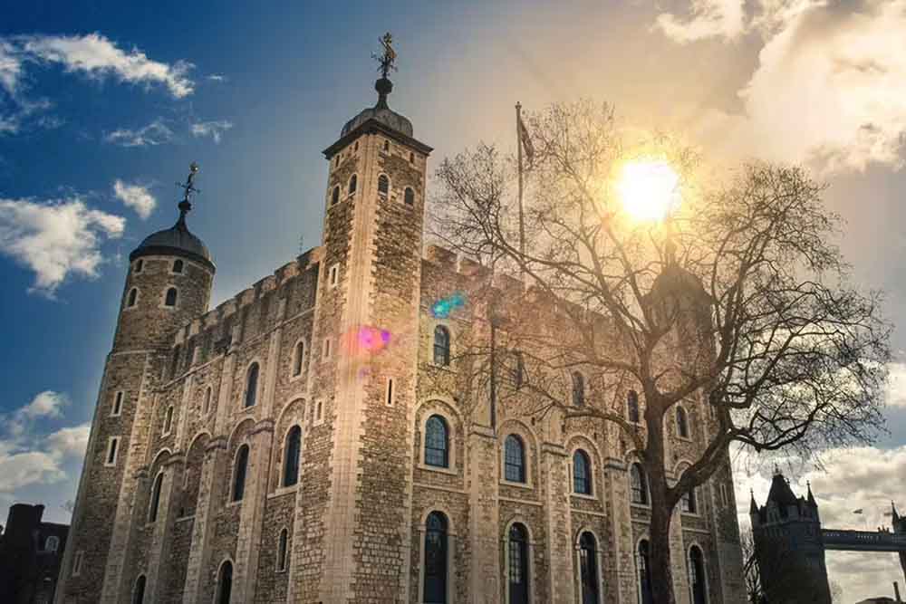 Tower of London - Discover the Tower of London, a historic fortress along the River Thames with over 1,000 years of history. Home to the Crown Jewels and legendary Beefeaters, this iconic landmark offers a thrilling journey through tales of British royalty, intrigue, and medieval history. An unforgettable experience for visitors of all ages. Tower of London - Image 1 of 5