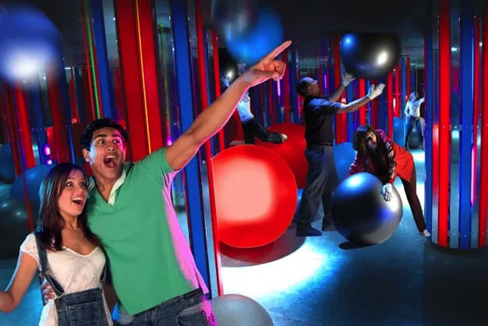 Infinity Attraction Gold Coast - Experience a mind-bending adventure at Infinity Attraction on the Gold Coast! Step into maze-like worlds filled with spectacular illusions, neon lights, and immersive environments. Perfect for friends and family, this unforgettable journey will spark your imagination and senses in every room. Infinity Attraction Gold Coast - Image 4 of 5