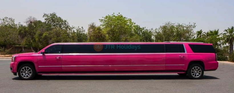 Limo Ride Dubai - GMC Yukon Barbie Pink - Experience a luxurious stretch limo ride in Dubai, ideal for anniversaries, birthdays, and celebrations. The GMC Yukon Barbie Limo seats up to 20 passengers and offers hourly rates with service across key areas in Dubai. For bookings outside standard locations or airport pickups, contact our team for availability and details. Limo Ride Dubai - GMC Yukon Barbie Pink - Image 3 of 5