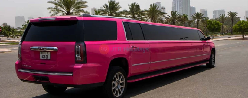 Limo Ride Dubai - GMC Yukon Barbie Pink - Experience a luxurious stretch limo ride in Dubai, ideal for anniversaries, birthdays, and celebrations. The GMC Yukon Barbie Limo seats up to 20 passengers and offers hourly rates with service across key areas in Dubai. For bookings outside standard locations or airport pickups, contact our team for availability and details. Limo Ride Dubai - GMC Yukon Barbie Pink - Image 4 of 5