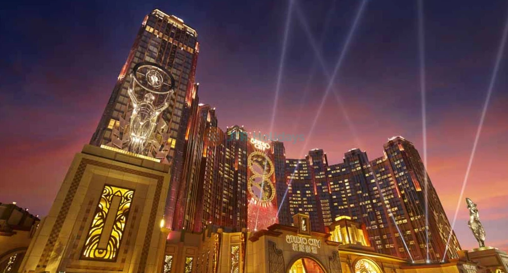 Golden Reel Ferris Wheel Macau - Experience the Golden Reel Ferris Wheel Macau, an iconic 8-shaped attraction at Studio City. Enjoy breathtaking views of Macau from 130 meters above the ground. Perfect for families, couples, and friends, the Golden Reel Ferris Wheel Macau offers a unique ride experience day or night. Plan your visit now and make unforgettable memories. Golden Reel Ferris Wheel Macau - Image 1 of 5