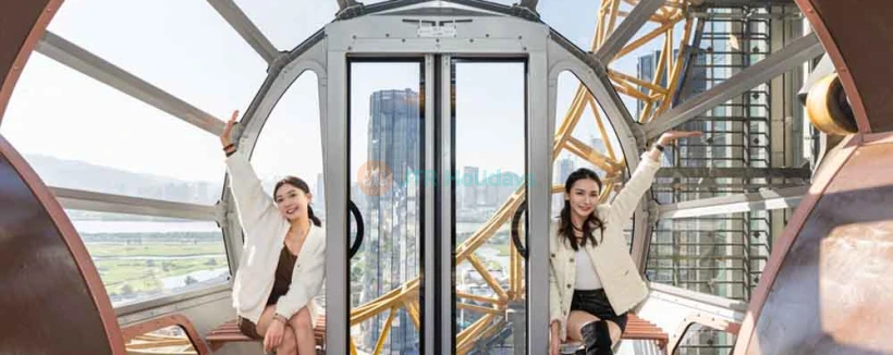 Golden Reel Ferris Wheel Macau - Experience the Golden Reel Ferris Wheel Macau, an iconic 8-shaped attraction at Studio City. Enjoy breathtaking views of Macau from 130 meters above the ground. Perfect for families, couples, and friends, the Golden Reel Ferris Wheel Macau offers a unique ride experience day or night. Plan your visit now and make unforgettable memories. Golden Reel Ferris Wheel Macau - Image 3 of 5