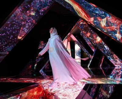 AYA Universe Dubai - Immerse yourself in a surreal world of art and technology at AYA Universe Dubai, the region's first light and sound park in WAFI City Mall. Explore 12 zones of immersive experiences, futuristic visuals, and celestial wonders. An otherworldly adventure awaits AYA Universe Dubai - Image 2 of 5