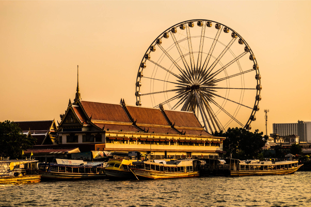 Asiatique Sky Ferris Wheel - Experience breathtaking views of Bangkok at the Asiatique Sky Ferris Wheel, Thailand’s largest observation wheel. The Asiatique Sky Ferris Wheel offers stunning sights of the Chao Phraya River and the city skyline, perfect for day or evening rides. Capture unforgettable moments on the Asiatique Sky Ferris Wheel, whether at sunset or under the sparkling city lights. Located in the heart of Bangkok’s vibrant riverfront market, the Asiatique Sky Ferris Wheel is a must-visit attraction for visitors of all ages. Enjoy a peaceful ride and amazing views at the Asiatique Sky Ferris Wheel today! Asiatique Sky Ferris Wheel - Image 1 of 5