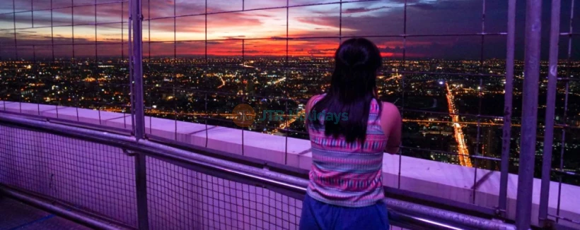 Baiyoke Observation Deck - Discover the breathtaking views from the Baiyoke Sky Hotel Observation Deck, one of Bangkok’s must-visit attractions. Experience panoramic sights from the 77th floor and the revolving viewpoint on the 84th floor. The Baiyoke Sky Hotel Observation Deck offers stunning 360-degree views of the city and beyond. Don’t miss the chance to enjoy a complimentary drink at the Roof Top Bar on the 83rd floor while exploring the Baiyoke Sky Hotel Observation Deck. Perfect for photography and unforgettable moments! Baiyoke Observation Deck - Image 4 of 5