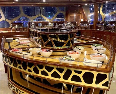 Ocean Empress Dinner Cruise - Dubai Marina - Make your evening special with the worlds largest and most luxurious traditional boat in Dubai Marina. The Ocean Empress capacity is 500 guests and 16,000 Sq feet of space with multiple decks. Overwhelming views and wide selection of food and live cooking. The Cruise boarding time is 8PM with also a lot of entertainment on board. Ocean Empress Dinner Cruise - Dubai Marina - Image 5 of 5