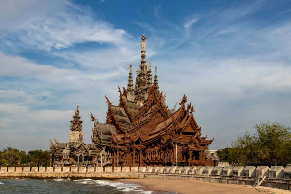 Sanctuary of Truth - Explore the breathtaking beauty of the Sanctuary of Truth, a masterpiece of wooden architecture and ancient carvings. The Sanctuary of Truth showcases intricate designs inspired by Khmer, Buddhist, and Hindu influences. Marvel at the hand-carved woodwork that decorates every corner of the Sanctuary of Truth. Standing 105 meters tall, the Sanctuary of Truth combines art, culture, and philosophy in a peaceful setting. Visit the Sanctuary of Truth to experience a blend of history and craftsmanship like never before! Sanctuary of Truth - Image 3 of 5