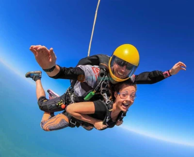 Skydive Dubai - A tandem skydive is the quickest and easiest way to experience the thrill of freefall at over 120 miles per hour, while securely harnessed to one of our experienced and accomplished instructors. Adrenaline enthusiasts can live this adventure at our two world-class locations, the Palm Dropzone and the Desert Dropzone. Skydive Dubai - Image 5 of 5