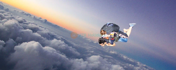 Skydive Dubai - A tandem skydive is the quickest and easiest way to experience the thrill of freefall at over 120 miles per hour, while securely harnessed to one of our experienced and accomplished instructors. Adrenaline enthusiasts can live this adventure at our two world-class locations, the Palm Dropzone and the Desert Dropzone. Skydive Dubai - Image 4 of 5