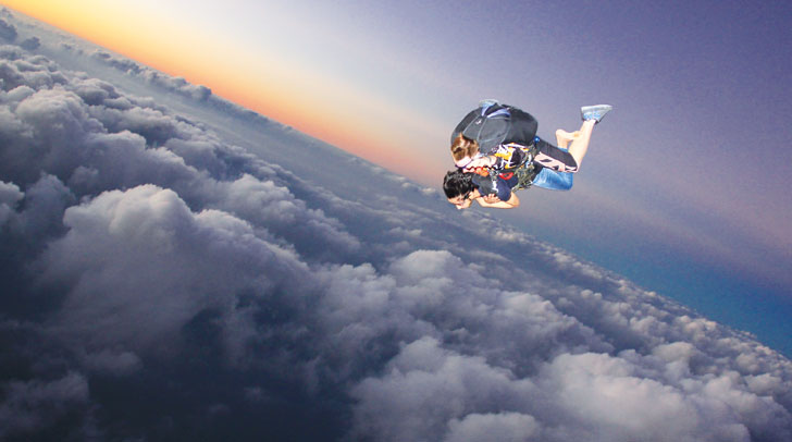 Skydive Dubai - A tandem skydive is the quickest and easiest way to experience the thrill of freefall at over 120 miles per hour, while securely harnessed to one of our experienced and accomplished instructors. Adrenaline enthusiasts can live this adventure at our two world-class locations, the Palm Dropzone and the Desert Dropzone. Skydive Dubai - Image 4 of 5