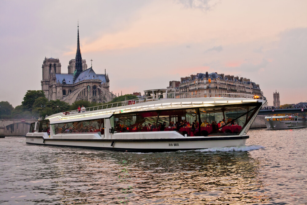 Seine River Cruise by Bateaux Mouches - Experience the beauty of Paris with the Seine River Cruise by Bateaux Mouches. The Seine River Cruise by Bateaux Mouches offers stunning views of iconic landmarks like the Eiffel Tower, Notre-Dame Cathedral, and the Louvre. As you sail along the Seine River, enjoy informative commentary that brings Paris’s history to life. The Seine River Cruise by Bateaux Mouches lets you see the city from a unique perspective, offering a peaceful and unforgettable experience. Don’t miss out on the Seine River Cruise by Bateaux Mouches for a perfect way to explore Paris! Seine River Cruise by Bateaux Mouches - Image 2 of 5