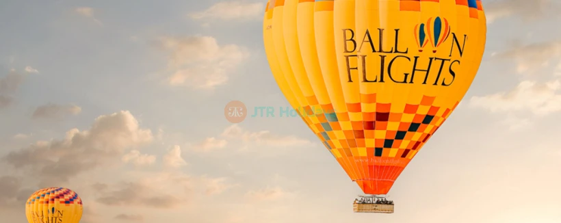Sunrise Hot Air Balloon Flight - Experience the magic of a sunrise hot air balloon flight, soaring over stunning landscapes as the sun rises. Enjoy breathtaking views, peaceful moments, and unforgettable memories on this unique adventure. Sunrise Hot Air Balloon Flight - Image 3 of 5