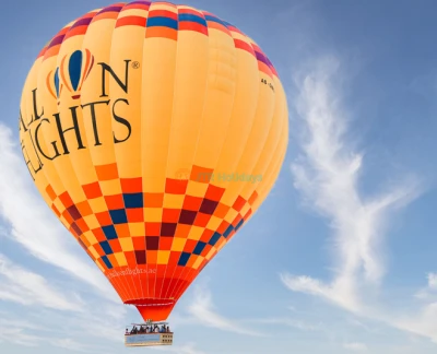 Sunrise Hot Air Balloon Flight - Experience the magic of a sunrise hot air balloon flight, soaring over stunning landscapes as the sun rises. Enjoy breathtaking views, peaceful moments, and unforgettable memories on this unique adventure. Sunrise Hot Air Balloon Flight - Image 5 of 5
