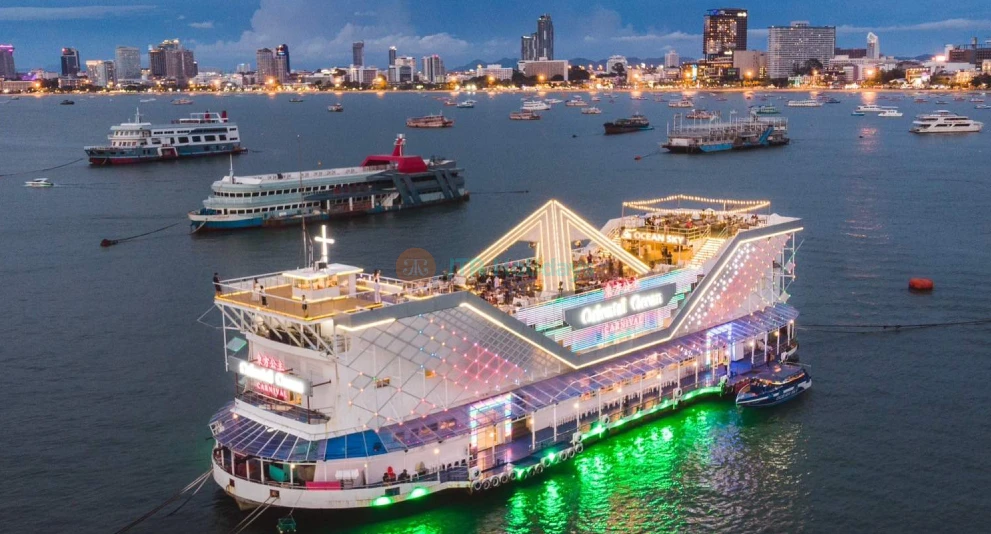 Ocean Sky Pattaya Tickets - Ocean Sky Pattaya offers breathtaking views of the city and the Gulf of Thailand from its observation deck. Enjoy a unique glass-bottomed Skywalk for an exciting experience at Ocean Sky Pattaya. Indulge in a 1.5-hour dinner buffet with dishes from around the world, while enjoying live entertainment. Ocean Sky Pattaya also features vibrant cabaret and macho shows, making it the perfect place to relax and unwind. Ideal for families, couples, and solo travelers, Ocean Sky Pattaya promises unforgettable memories. Ocean Sky Pattaya Tickets - Image 1 of 5