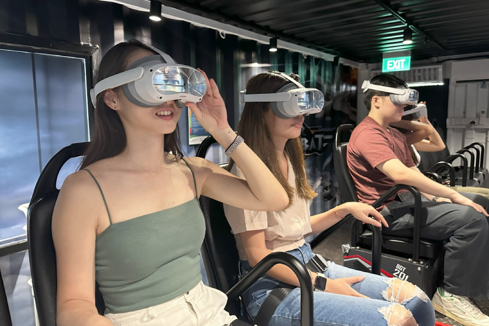 DinoVenture Virtual Reality Experience - Step into the world of dinosaurs with the DinoVenture Virtual Reality Experience. This exciting adventure takes you back in time to explore the age of dinosaurs through immersive VR technology. The DinoVenture Virtual Reality Experience offers a thrilling, educational journey where you can interact with lifelike dinosaurs in their natural habitat. Whether you're an avid dinosaur fan or just looking for a unique experience, DinoVenture Virtual Reality Experience is perfect for all ages. Don’t miss out on this unforgettable adventure with the DinoVenture Virtual Reality Experience! DinoVenture Virtual Reality Experience - Image 1 of 5
