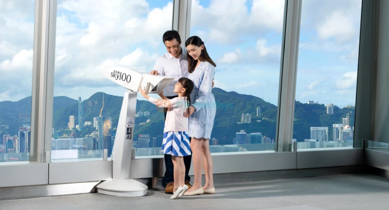 Sky100 Hong Kong Observation Deck - Sky100 Hong Kong Observation Deck offers breathtaking 360-degree panoramic views of Victoria Harbour, Hong Kong Island, Kowloon, and the New Territories. At Sky100 Hong Kong Observation Deck, you can reach the 100th floor in just 60 seconds with the city’s fastest elevators. Experience the "Love is in the Sky" light show daily, featuring 3D animations inspired by Hong Kong. Visit Sky100 Hong Kong Observation Deck for an unforgettable view and a unique perspective of the city! Sky100 Hong Kong Observation Deck - Image 1 of 5