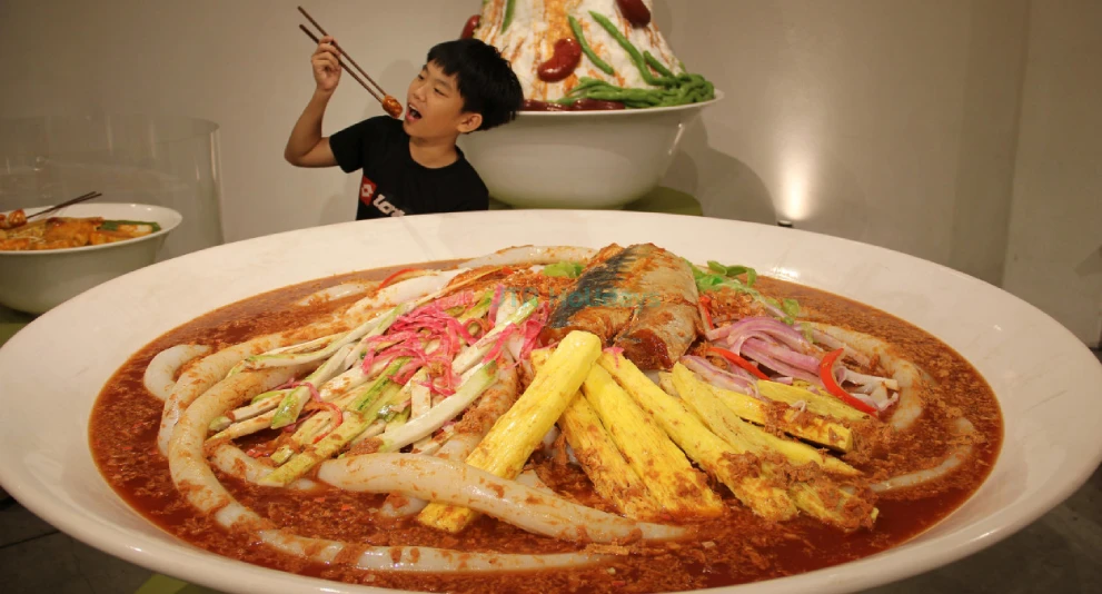 Wonderfood Museum - Discover the vibrant food culture of Malaysia at the Wonderfood Museum in Penang. Explore life-sized displays of Malaysia’s most famous dishes in this fun and interactive museum. The Wonderfood Museum offers a unique experience where you can learn about the country's rich culinary history while snapping amazing photos of hyper-realistic food models. Perfect for families and food lovers, the Wonderfood Museum provides an exciting and educational look at Malaysia’s diverse food culture. Visit the Wonderfood Museum for a memorable adventure into Malaysia’s food heritage! Wonderfood Museum - Image 1 of 5