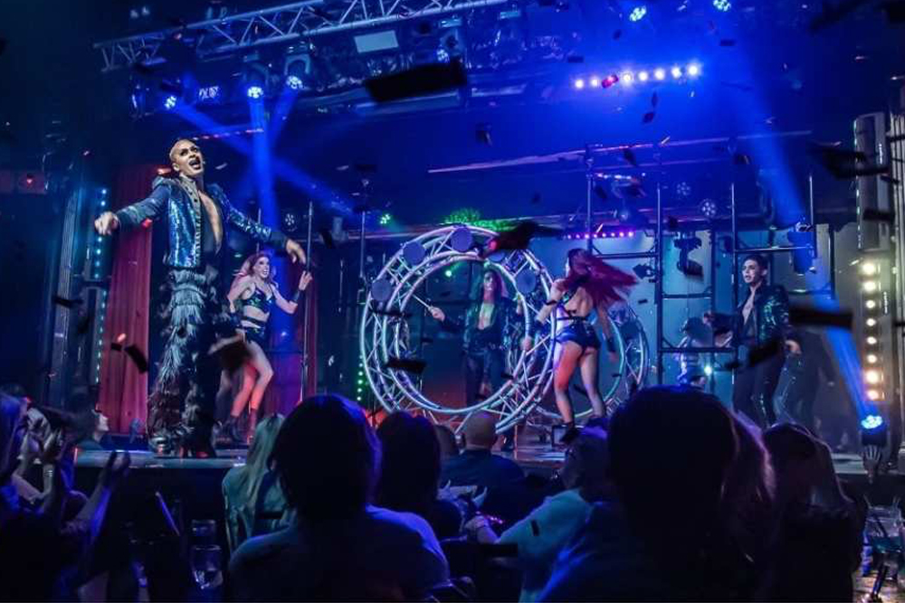 Dracula's Cabaret Dinner & Show Tickets - Experience a thrilling night at Dracula's Cabaret Dinner & Show on the Gold Coast. This unique evening combines a delicious three-course meal with electrifying live performances, including satire, music, and dramatic storytelling. Begin with a ghost train ride and immerse yourself in a Gothic-themed atmosphere filled with humor and energetic dance routines. Perfect for a fun and unforgettable night out, Dracula's Cabaret offers a magical blend of dining and entertainment. Dracula's Cabaret Dinner & Show Tickets - Image 2 of 5