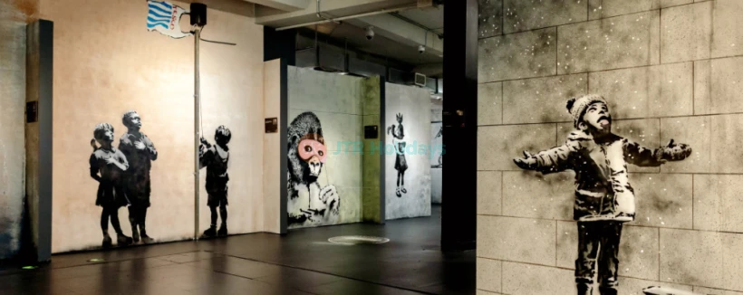 Banksy Museum New York - Explore the world of street art at Banksy Museum New York, home to over 160 recreated works by the legendary anonymous artist. Admire life-sized replicas of iconic pieces like Girl With Balloon and Rage, Flower Thrower at Banksy Museum New York. Dive into the powerful messages of satire and social commentary that define his art. Located in the historic Oltarsh Building, Banksy Museum New York offers an immersive experience for art lovers and fans of urban culture. Visit Banksy Museum New York for a journey into the mind of a street art legend! Banksy Museum New York - Image 4 of 5