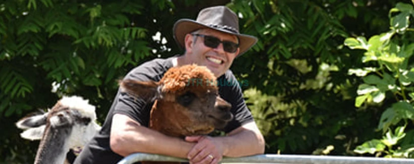 Cornerstone Alpaca Farm Ticket - Visit Cornerstone Alpaca Farm for a delightful and educational experience. Get up close to adorable alpacas, hand-feed them, and cuddle their fluffy babies in the paddocks. Learn about alpaca wool and its unique uses while exploring the farm. Capture unforgettable moments and make memories with these gentle animals. Cornerstone Alpaca Farm Ticket - Image 4 of 5