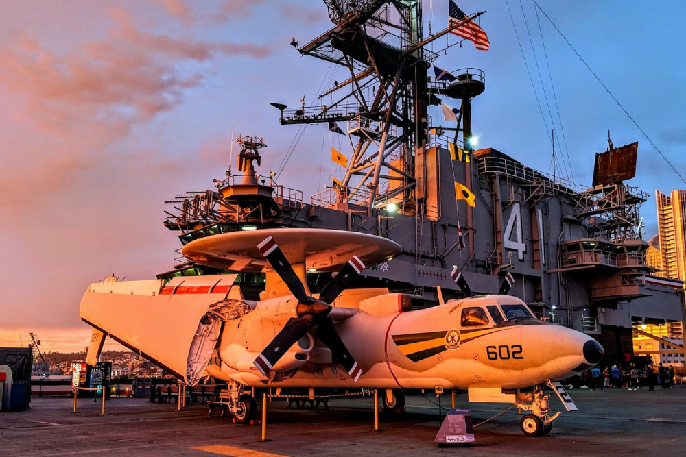USS Midway Museum San Diego - Get your USS Midway Museum Tickets and explore the most visited floating ship museum in the United States. With your USS Midway Museum Tickets, enjoy access to 60 exciting exhibits and 29 restored aircraft, including the Captain’s bridge and engine room. Your USS Midway Museum Tickets include a self-guided audio tour narrated by former sailors, available in multiple languages. Don’t miss the thrilling flight simulators and the Battle of Midway Theater—secure your USS Midway Museum Tickets today for an unforgettable adventure! USS Midway Museum San Diego - Image 1 of 5